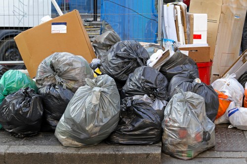 Professionals conducting home clearance in Twickenham living room